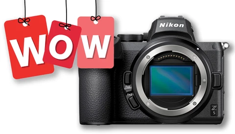 Nikon Z mirrorless camera body displayed next to red promotional tags reading 'WOW'.