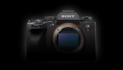 Sony Alpha 1 full-frame mirrorless camera body against a dark background.