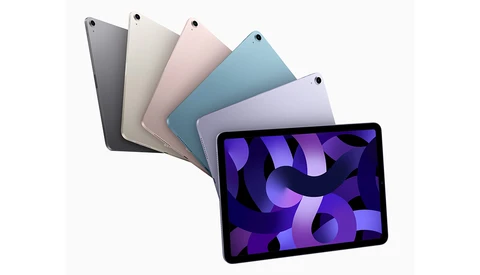 Illustration of tablet devices arranged in a fan display showing multiple color options and a purple abstract wallpaper on the front screen.