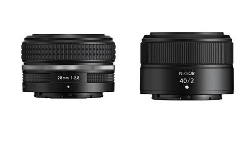 Side-by-side comparison of two black Nikkor camera lenses with different focal lengths and apertures.