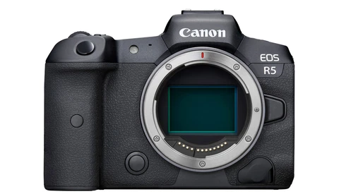 Canon EOS R5 mirrorless camera body with open sensor displayed against white background.