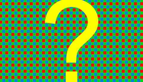Large yellow question mark centered on a colorful red, green, and blue dotted background pattern.
