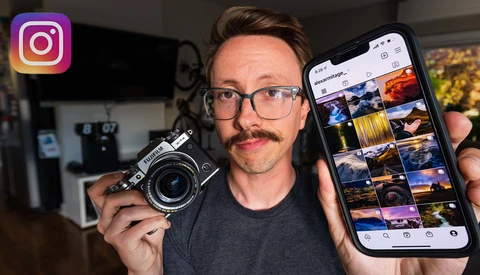 Photographer holding a vintage film camera in one hand and a smartphone displaying Instagram feed in the other.