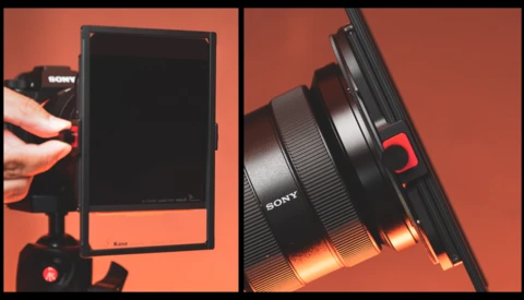 Sony monitor and lens photographed against warm orange backdrop with dramatic lighting.