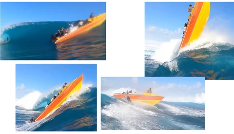 Bright orange and yellow jet ski performing aerial maneuvers across large ocean waves under clear sky.