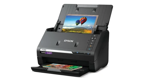 Epson FastFoto FF-640 document scanner with photo displayed on built-in preview screen.