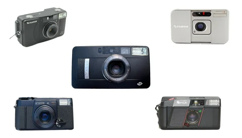 Five compact film cameras arranged in a grid pattern against a white background.