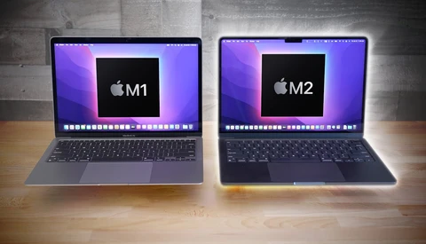 Side-by-side comparison of two Apple MacBook laptops displaying M1 and M2 chip boot screens.