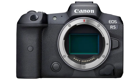 Canon EOS R5 mirrorless camera body displayed head-on against white background.