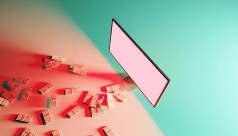 Scattered red and gold gift boxes on a split pink and turquoise background with a blank pink smartphone screen tilted upward.