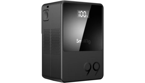 Compact black power bank with digital display showing 100% battery level and 99 indicator.