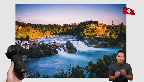 Waterfall landscape with turquoise river, forested hills, and stone bridge under golden sunset light.