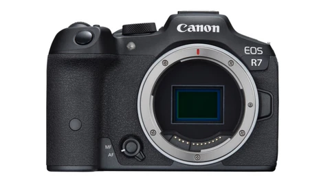 Canon EOS R7 mirrorless camera body shown from front with sensor visible through open mount.