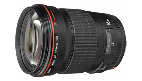 Canon EF 35mm f/1.4L USM lens with red accent ring and glass elements visible through front element.