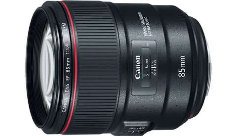 Canon EF 85mm f/1.4L IS USM telephoto lens with red ring accent against white background.