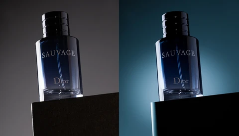 Dior Sauvage fragrance bottle photographed against contrasting gray and teal backgrounds.