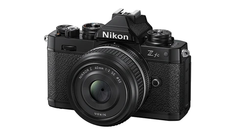 Nikon Z fc mirrorless camera with 40mm lens mounted, shown on white background.