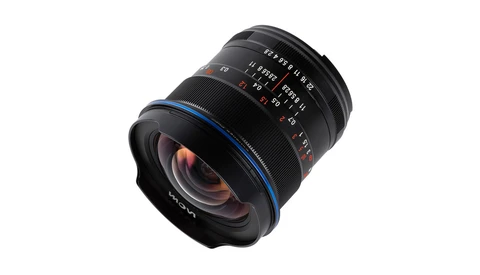 Wide-angle prime lens with blue accent ring and manual focus distance scale.