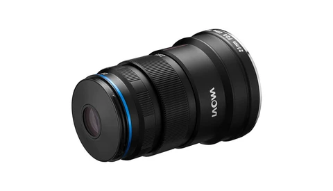 Laowa ultra-wide angle lens with blue accent ring and focus helicoid visible.