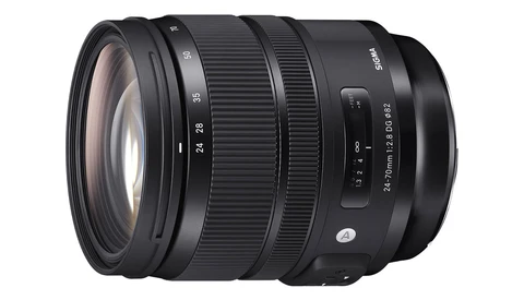 Sigma 24-70mm f/2.8 DG HSM Art lens with focus ring and AF/MF switch visible against white background.