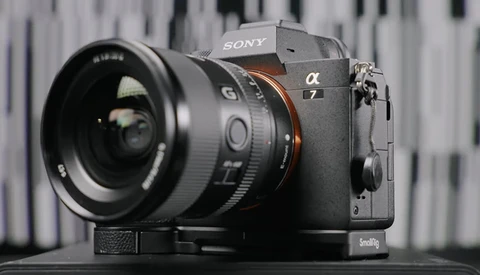 Sony a7 mirrorless camera with wide-angle lens mounted on a tripod plate.