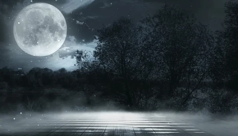 Full moon illuminating a misty forest landscape with a reflective water surface in the foreground.
