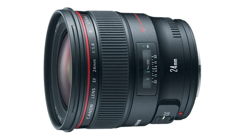 Canon EF 24mm f/1.4L USM prime lens with red accents and focus ring visible.