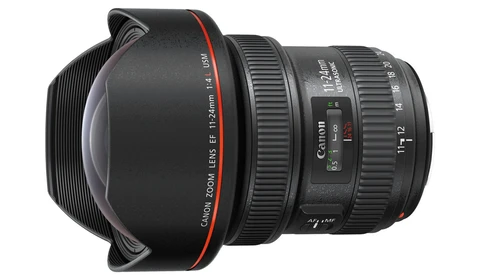 Canon TS-E 17mm f/4L ultra-wide tilt-shift lens with hood attached, shown from front angle.