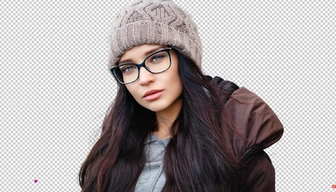 Young woman wearing glasses and a knit beanie with long dark hair and brown jacket.