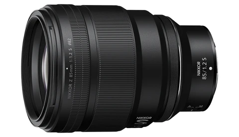 Nikon Z 24-70mm f/2.8 S lens with telephoto extension mounted, shown against white background.