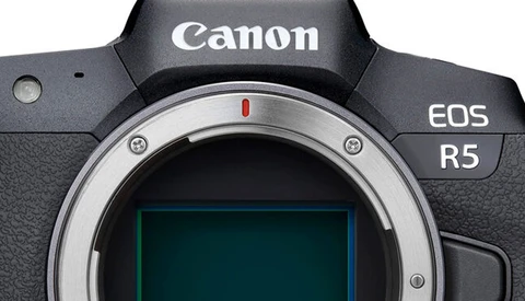 Canon EOS R5 mirrorless camera body shown from front, displaying the lens mount and sensor area.