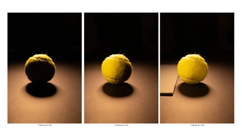 Three-frame sequence of a yellow tennis ball with dramatic side lighting and shadows on a warm brown surface.