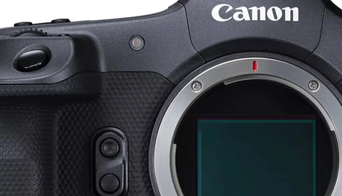 Canon DSLR camera body showing the mirror box and sensor with lens mount visible.