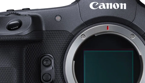Canon mirrorless camera body with open sensor mount and metal lens contact ring visible.
