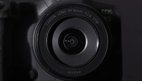 Canon RF 16mm f/2.8 STM lens mounted on an EOS R camera body, shot from above in black and white.