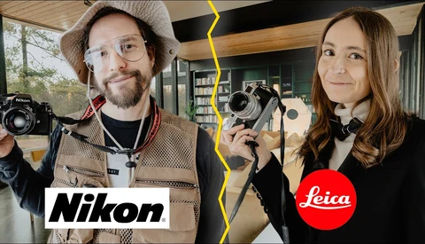 Two photographers holding film cameras, divided by a yellow lightning bolt graphic with Nikon and Leica logos.