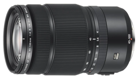 Telephoto zoom lens with extended barrel and focus ring against white background.