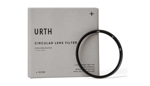 Urth Circular Lens Filter by x GORE next to its retail packaging on neutral background.