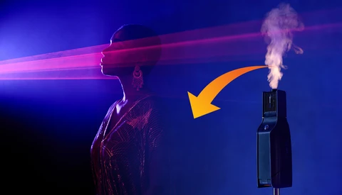 Silhouetted figure with pink light beams emanating from head, facing a vape device with visible vapor and orange arrow pointing upward.