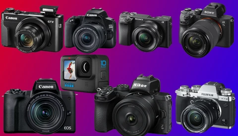 Collection of eight compact and mirrorless digital cameras from Canon, Sony, Nikon, and Fujifilm arranged against a red-to-purple gradient background.