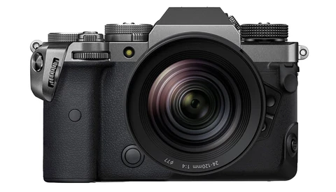 Mirrorless camera with attached zoom lens shown against white background.