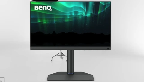 BenQ monitor on an adjustable pedestal stand against a light gray background.