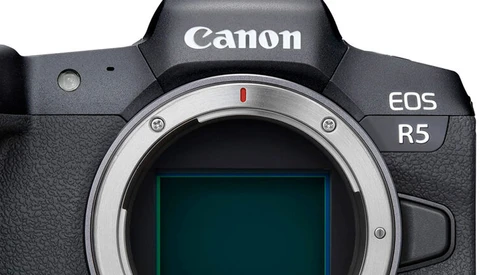 Canon EOS R5 mirrorless camera body front view showing lens mount and sensor.