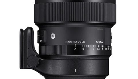 Sigma 14mm f/1.8 DG HSM Art lens with hood attached, shown against white background.