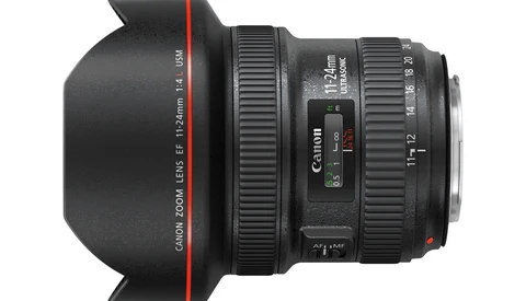 Canon zoom lens with 12-22mm focal length and f/2.8 maximum aperture, shown with lens hood attached.