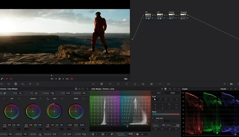 Screenshot of color grading interface showing waveform, histogram, and color wheels during post-processing workflow.
