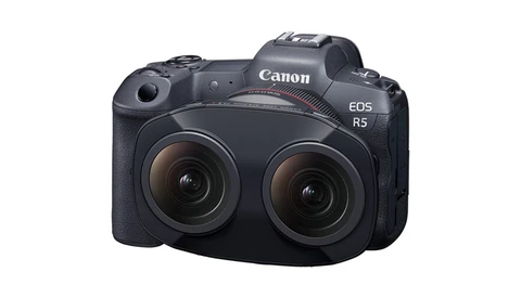 Canon EOS R5 mirrorless camera with dual lens setup, front-facing view against white background.