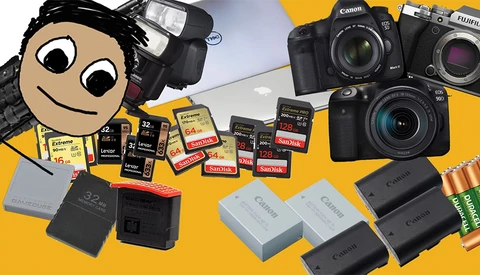 Photography gear collection displayed on yellow background, including cameras, memory cards, batteries, and flash units.