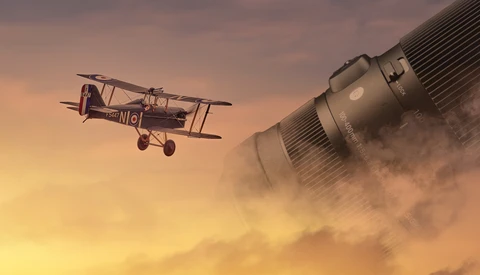 Vintage biplane in flight against a golden sunset sky with an airship partially visible on the right.