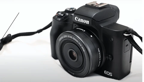 Canon EOS M50 Mark II mirrorless camera with attached 15-45mm kit lens against white background.